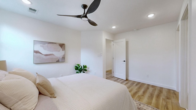 bedroom featuring light wood-type flooring and ceiling fan