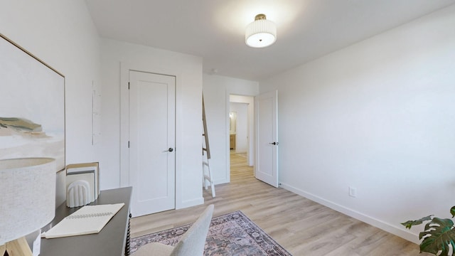 bedroom with light hardwood / wood-style flooring