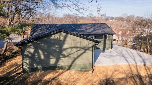 view of side of property featuring a patio area