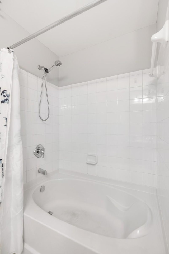 bathroom featuring shower / bath combination with curtain