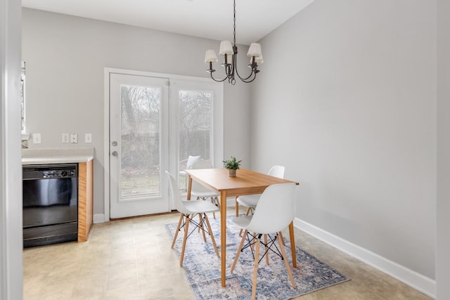 dining space featuring a chandelier