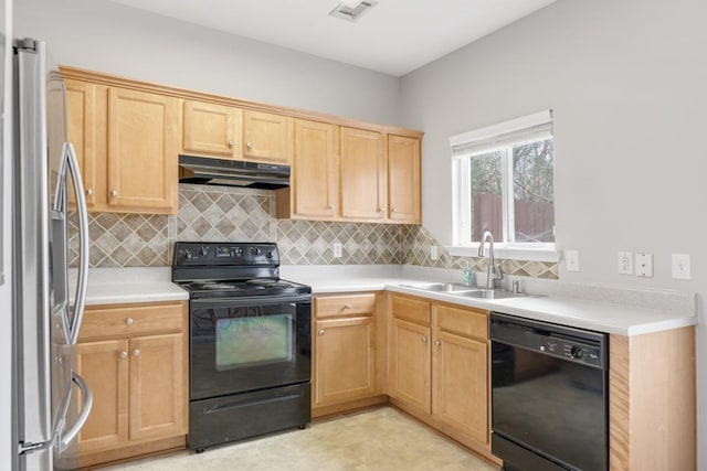 kitchen with black appliances, sink, light brown cabinetry, and tasteful backsplash