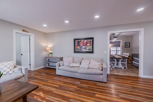 living room featuring dark hardwood / wood-style floors