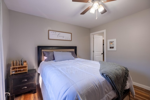 bedroom with ceiling fan and hardwood / wood-style floors