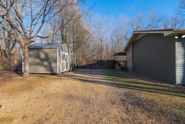 view of yard with a storage shed