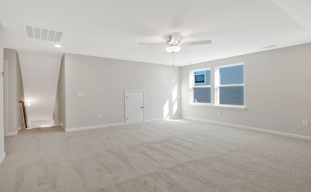 carpeted empty room with ceiling fan