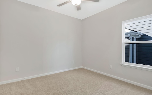 unfurnished room featuring carpet floors and ceiling fan