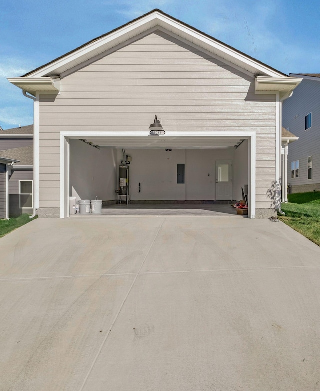 exterior space featuring electric panel and gas water heater