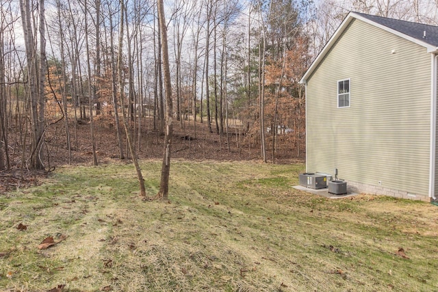 view of yard featuring central AC