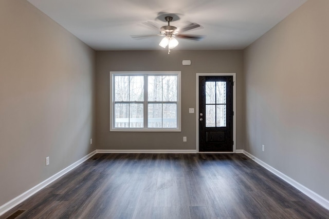 entrance foyer with ceiling fan and dark hardwood / wood-style flooring