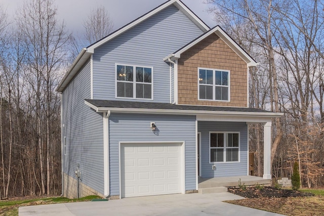 front of property featuring a garage