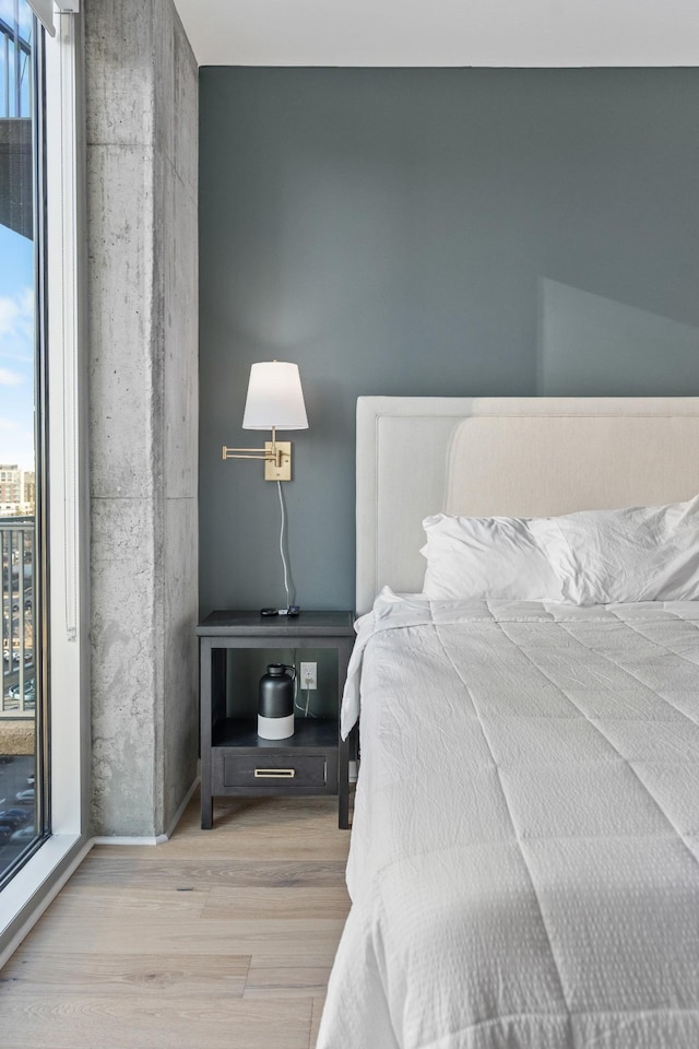 bedroom featuring hardwood / wood-style flooring