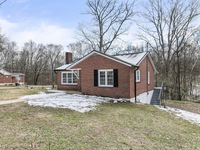 view of property exterior featuring central AC and a yard