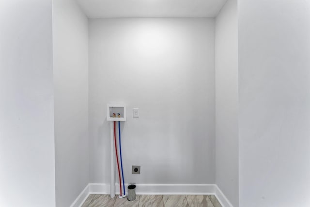 laundry room featuring hookup for a washing machine and hookup for an electric dryer