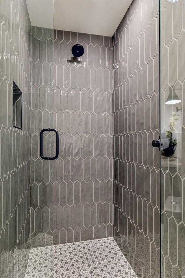 bathroom featuring walk in shower