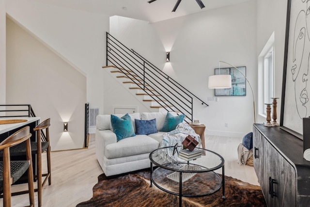 living room with light hardwood / wood-style flooring