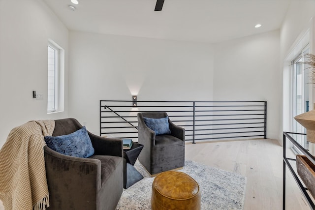 sitting room with light hardwood / wood-style flooring