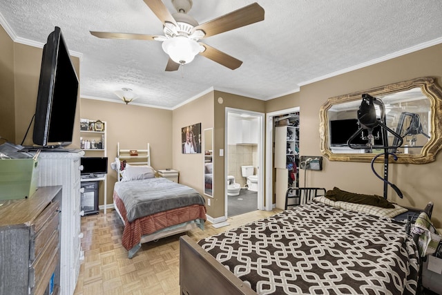 bedroom featuring a ceiling fan, ensuite bathroom, a textured ceiling, and crown molding