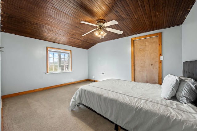 bedroom with carpet, vaulted ceiling, ceiling fan, and wooden ceiling