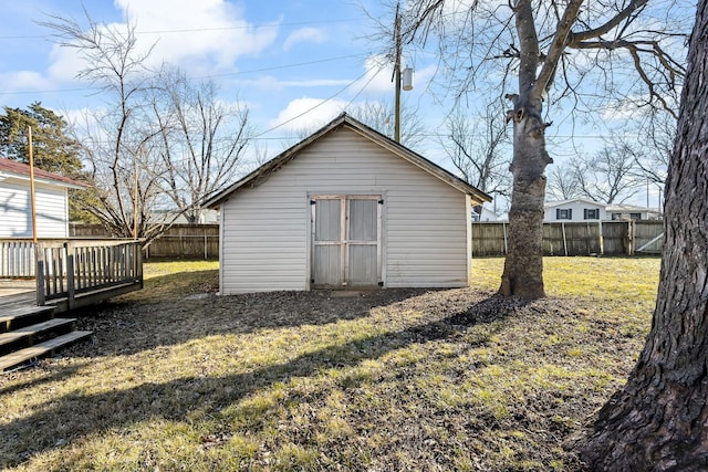 view of outdoor structure with a lawn