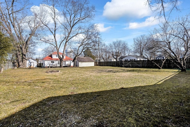 view of yard with a storage shed