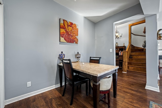 dining area featuring dark hardwood / wood-style floors