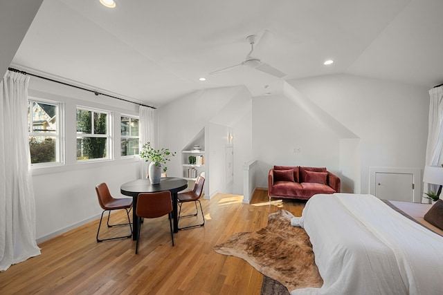 interior space featuring light hardwood / wood-style floors, ceiling fan, and lofted ceiling