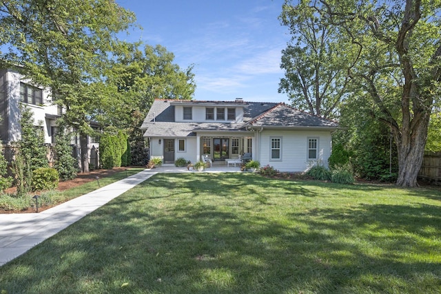 view of front of home featuring a front lawn