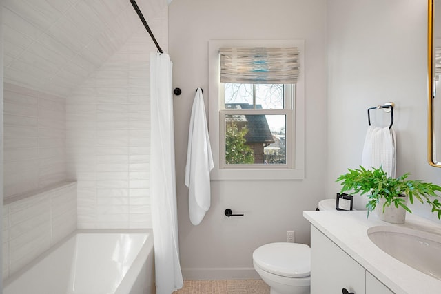 full bathroom with tile patterned flooring, shower / tub combo with curtain, vanity, and toilet