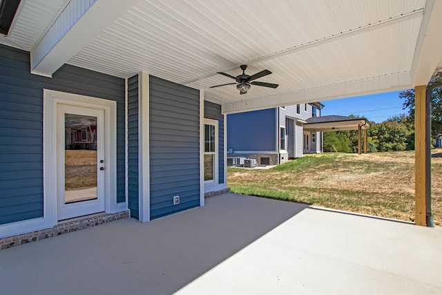 view of patio featuring ceiling fan