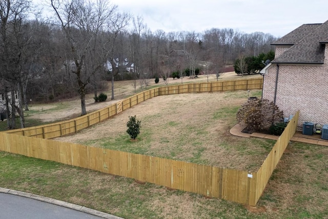 view of yard with central AC