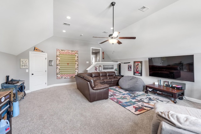 carpeted living room with vaulted ceiling and ceiling fan