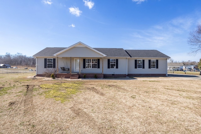 single story home featuring covered porch and a front lawn