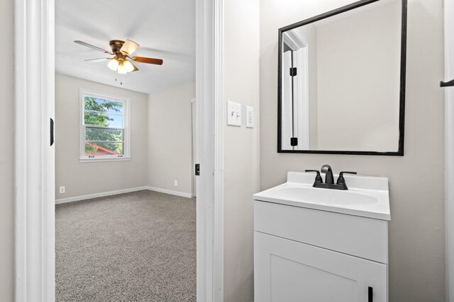 bathroom with vanity and ceiling fan