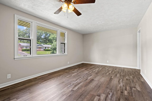 unfurnished room featuring a textured ceiling, ceiling fan, and dark hardwood / wood-style floors