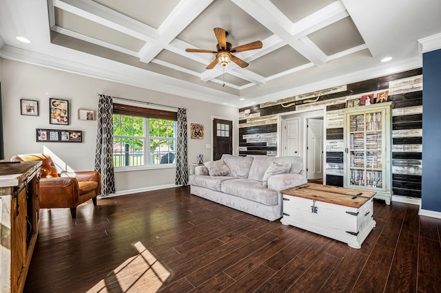 living room with ceiling fan, dark hardwood / wood-style floors, ornamental molding, and coffered ceiling