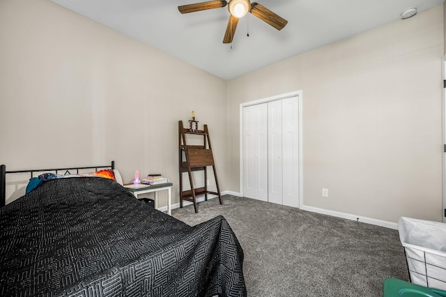 carpeted bedroom with ceiling fan and a closet