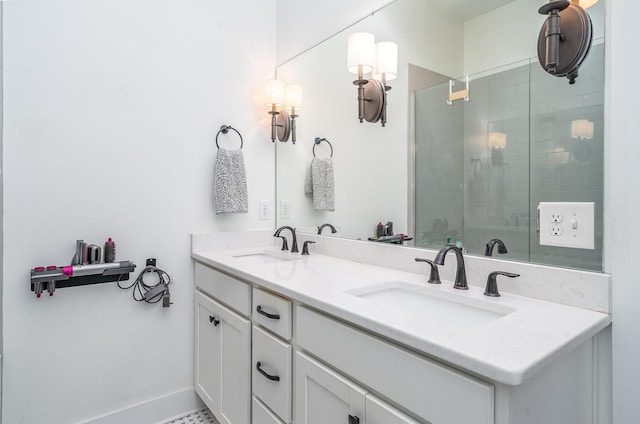 bathroom featuring vanity and an enclosed shower