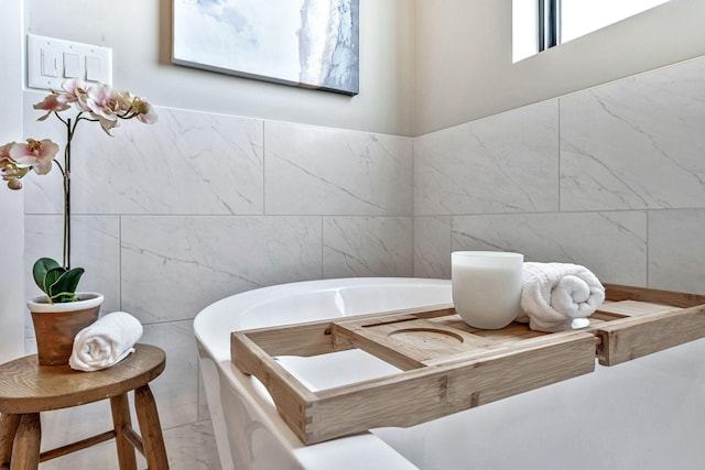 bathroom with a bathing tub