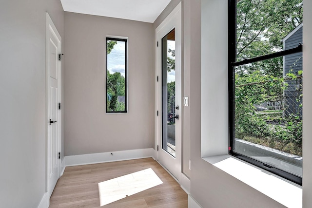 doorway featuring light hardwood / wood-style flooring