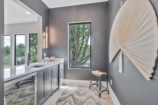 office area with sink and beverage cooler