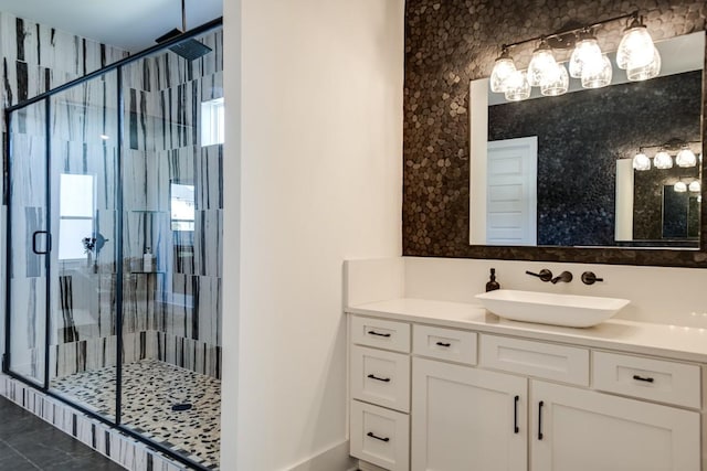 bathroom with vanity and an enclosed shower