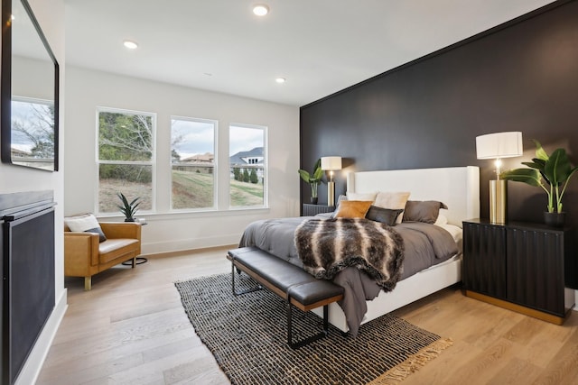 bedroom featuring light hardwood / wood-style floors