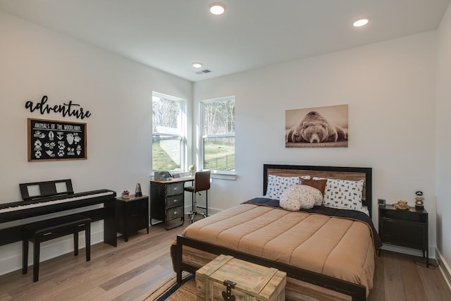 bedroom featuring wood-type flooring