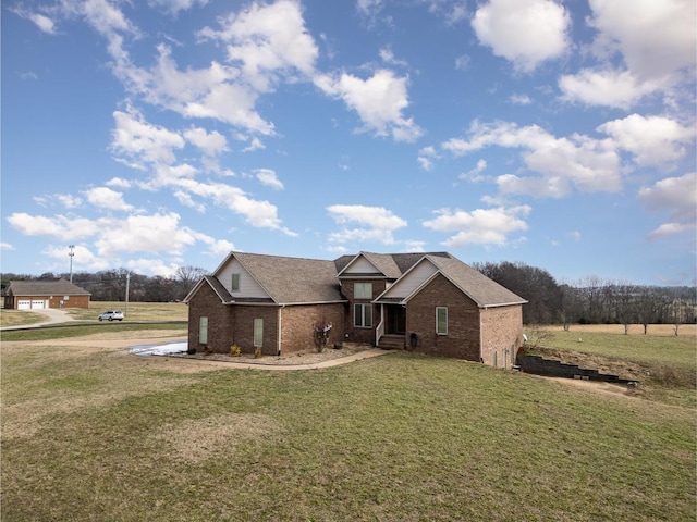 view of front of home with a front yard