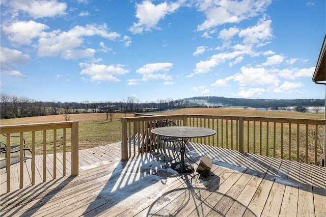 deck featuring a lawn