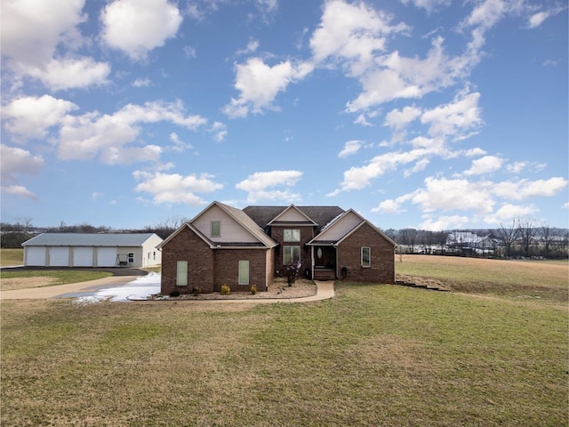 ranch-style home featuring a garage and a front lawn