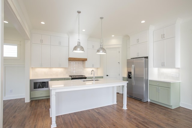 kitchen featuring dark hardwood / wood-style flooring, sink, white cabinets, and appliances with stainless steel finishes