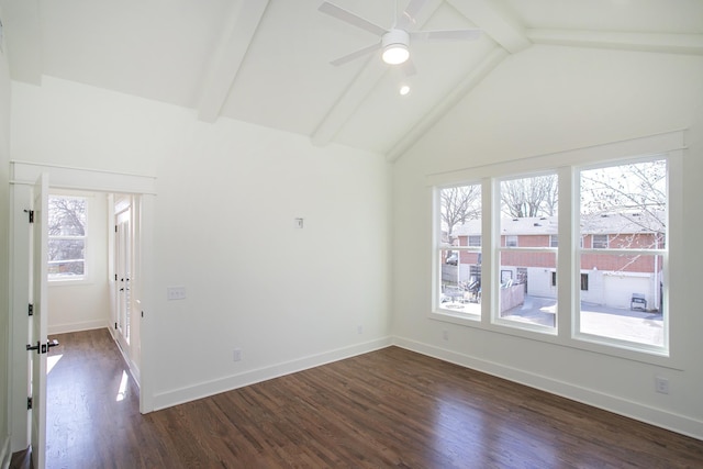 unfurnished room featuring dark hardwood / wood-style flooring, vaulted ceiling with beams, a healthy amount of sunlight, and ceiling fan