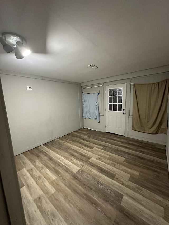 interior space with hardwood / wood-style floors